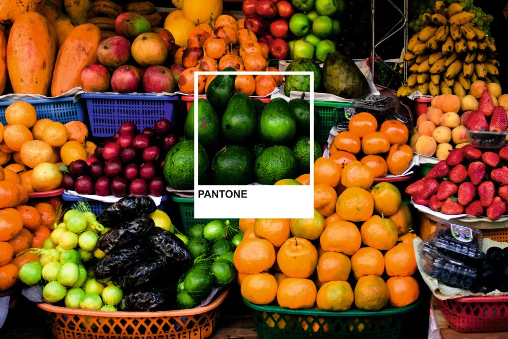 Vibrant assortment of fruits at an outdoor market stall, showcasing tropical flavors.